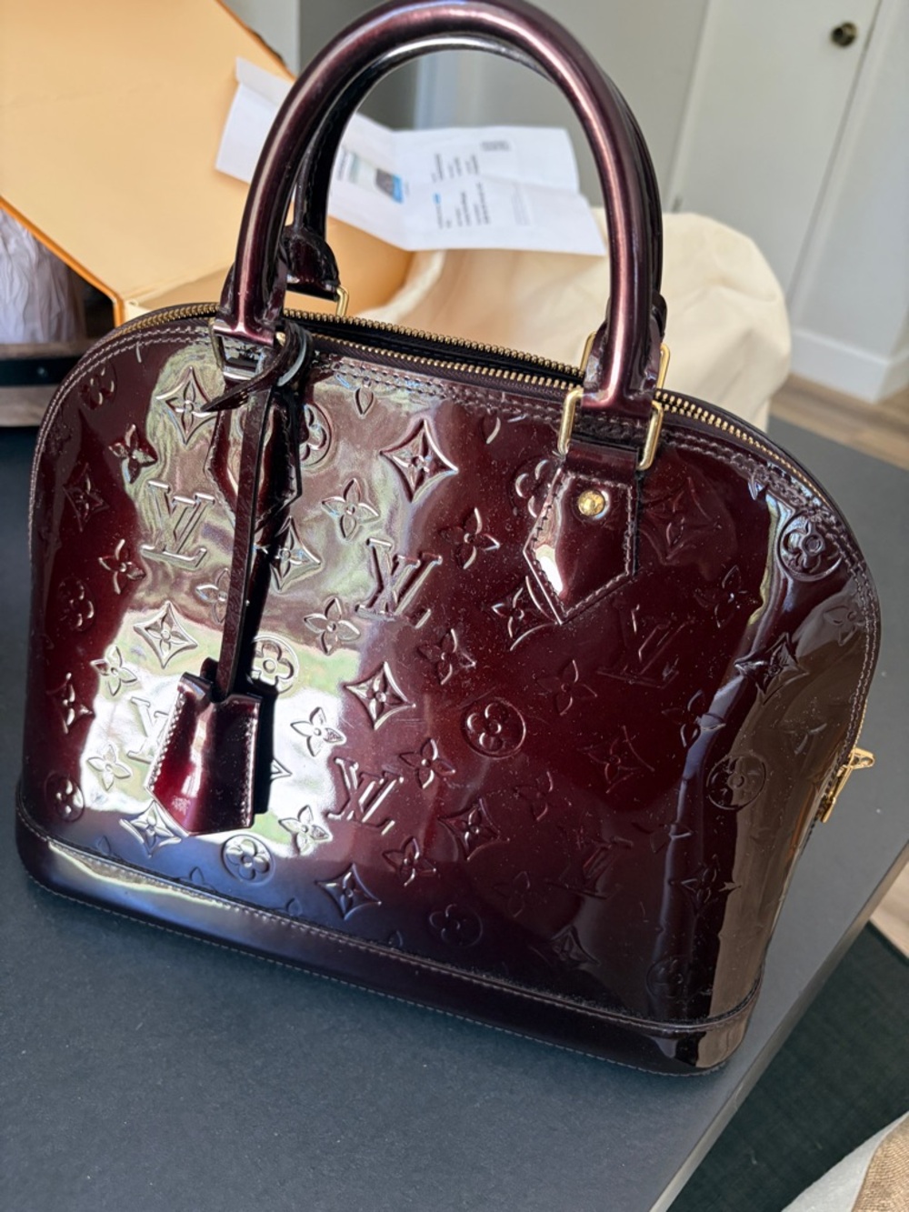 Louis Vuitton Vernis Alma PM Handbag in Burgundy